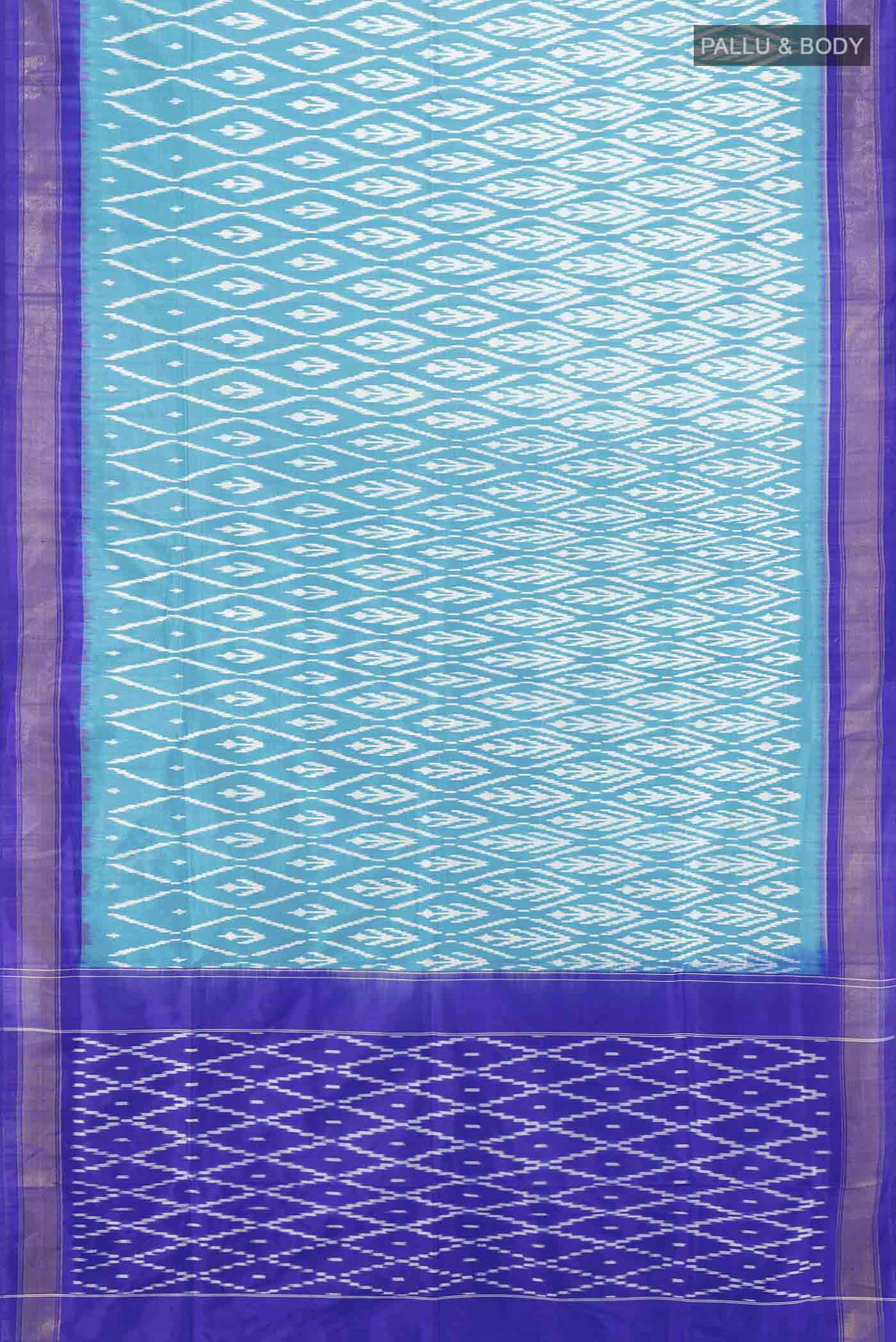 Flat view of Light Blue Pochampally Saree with Zari Butta on the body and Silk Border. 