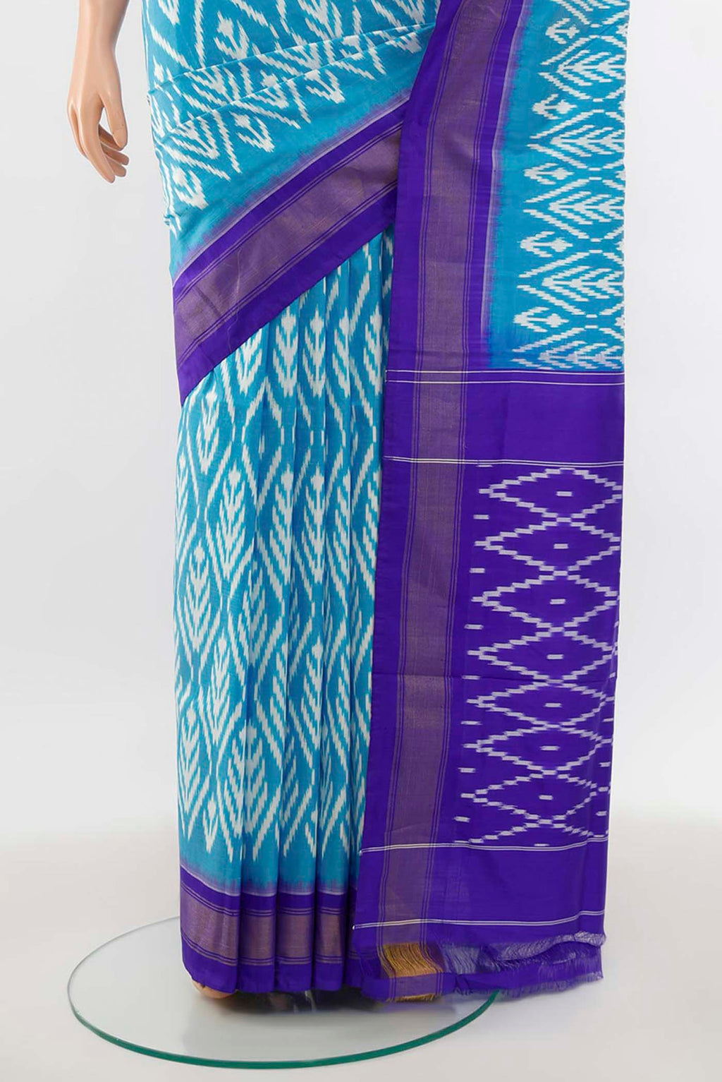 Pleats and pallu of Light Blue Pochampally Saree with Zari Butta on the body and Silk Border. 