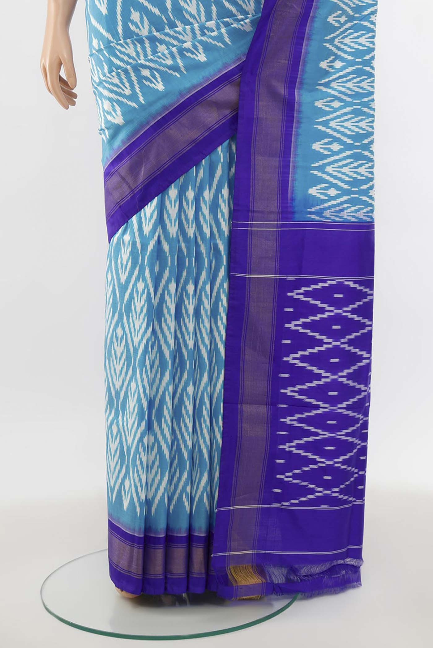 Pleats and pallu of Light Blue Pochampally Saree with Zari Butta on the body and Silk Border. 