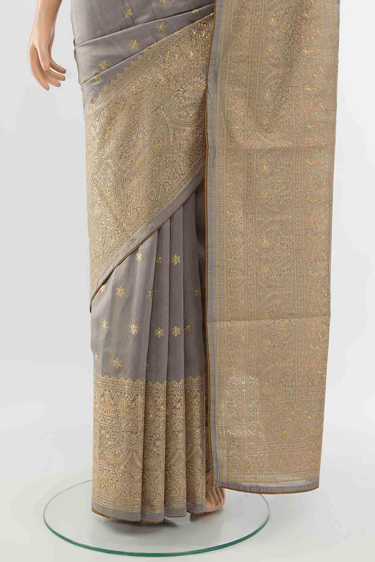 Pleats and pallu of Grey Art Silk Saree with Thread Butta on the body and Silk Border