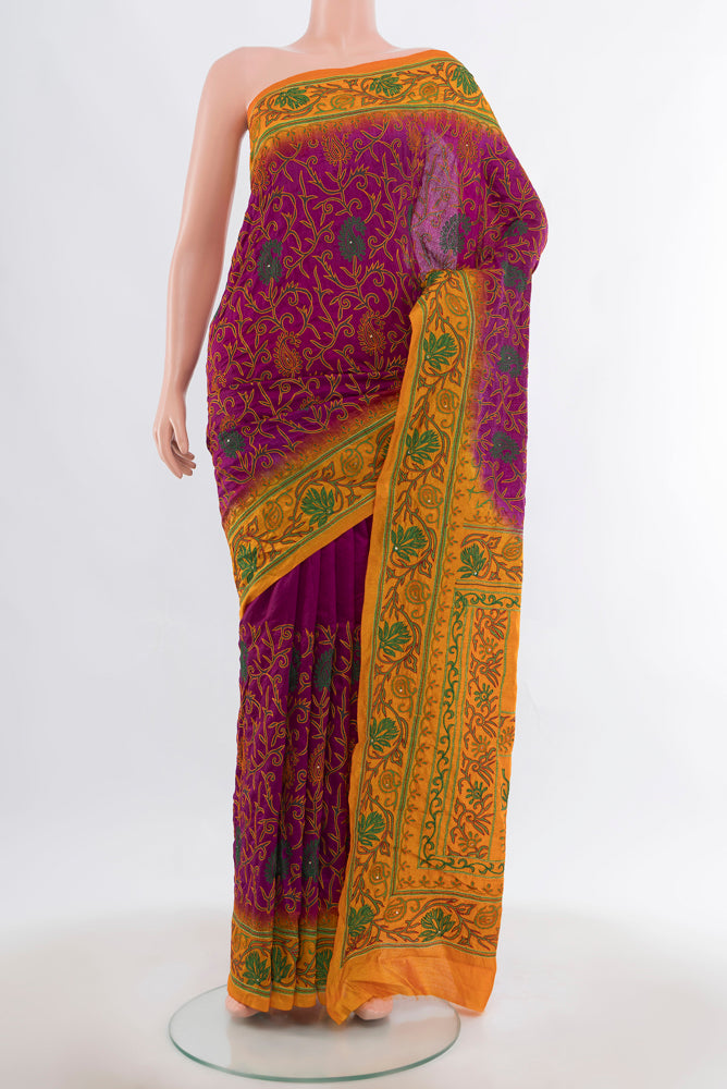 Purple Art Silk Saree with Embroidery on the body and Silk Border.  displayed on a mannequin