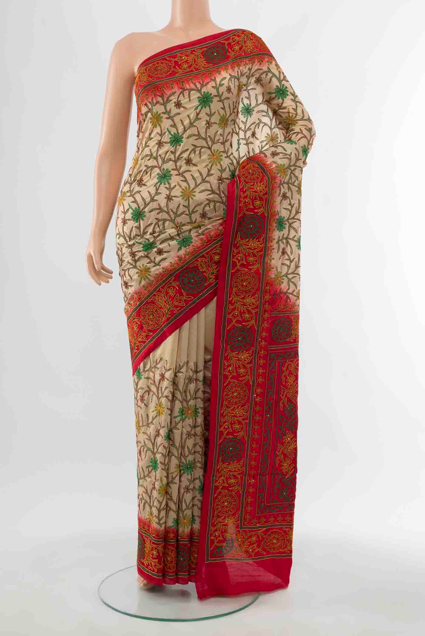 Beige Blended Raw Silk Saree with Embroidery on the body and Embroidery Border displayed on a mannequin