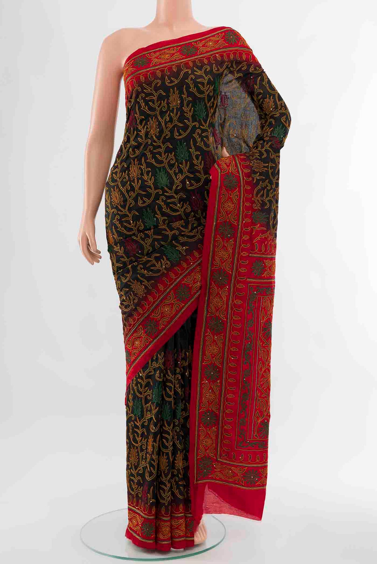 Black Blended Raw Silk Saree with Embroidery on the body and Embroidery Border displayed on a mannequin