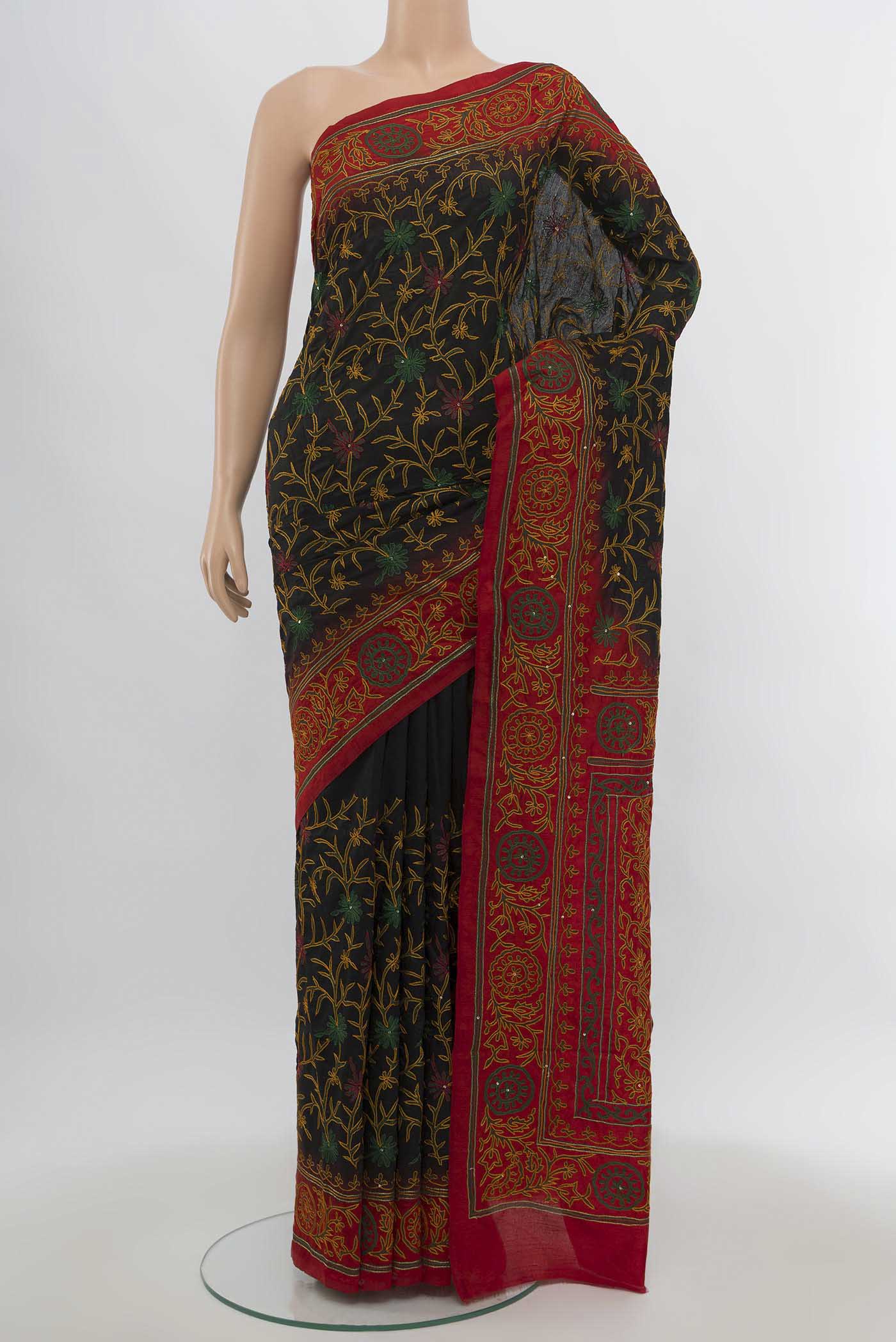 Black Art Silk Saree with Embroidery on the body and Silk Border.  displayed on a mannequin
