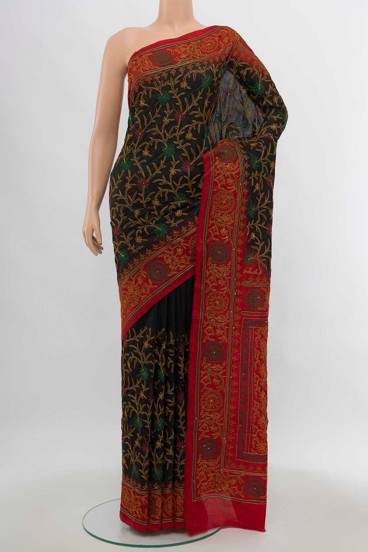 Black Art Silk Saree with Embroidery on the body and Silk Border.  displayed on a mannequin