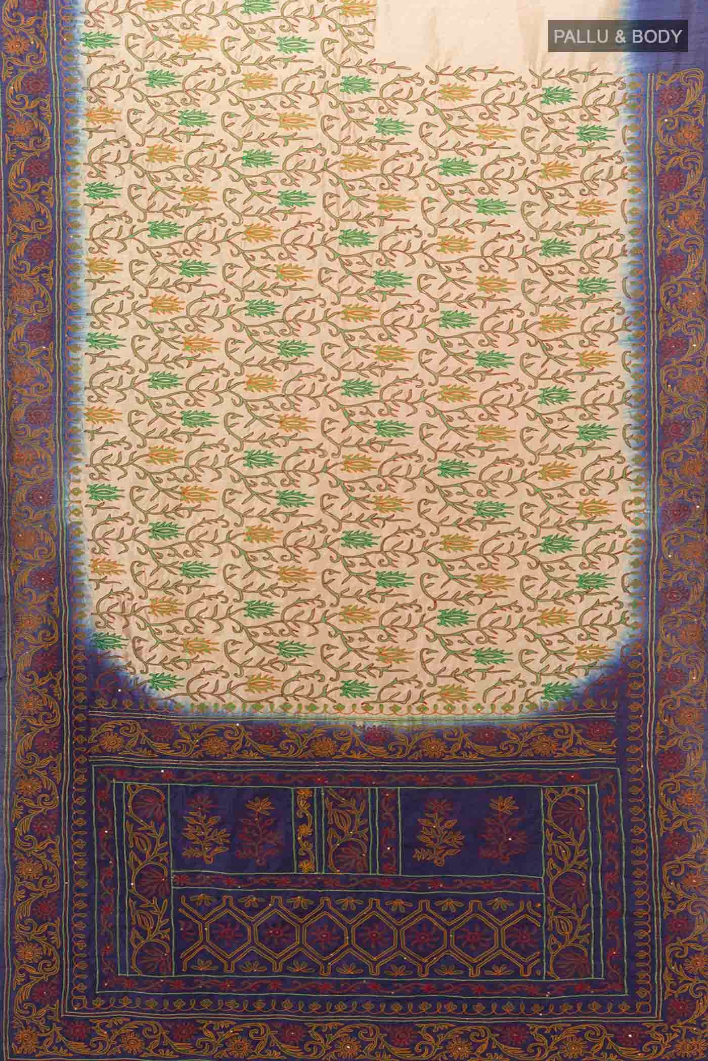 Flat view of Cream Blended Raw Silk Saree with Embroidery on the body and Embroidery Border