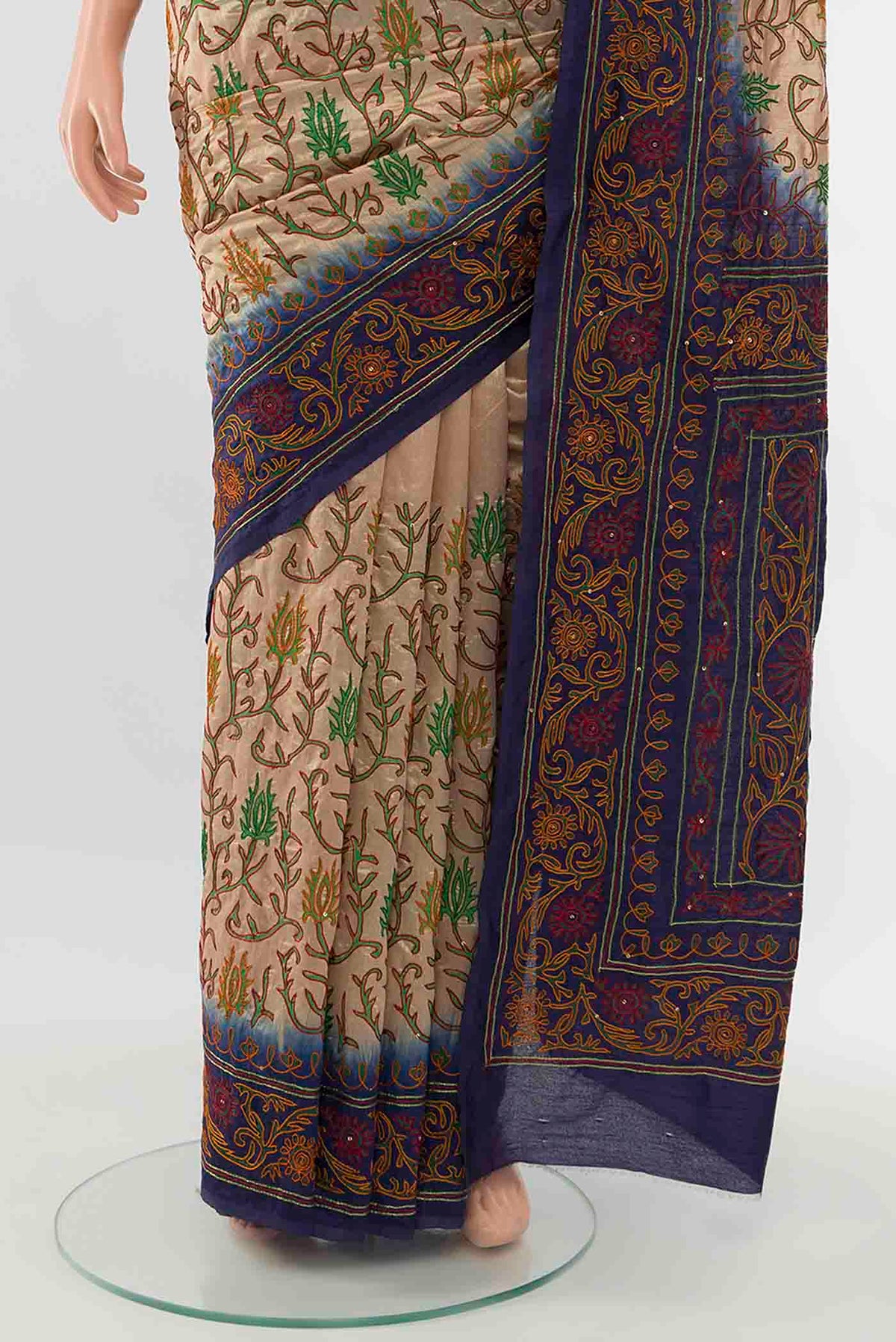 Pleats and pallu of Cream Blended Raw Silk Saree with Embroidery on the body and Embroidery Border