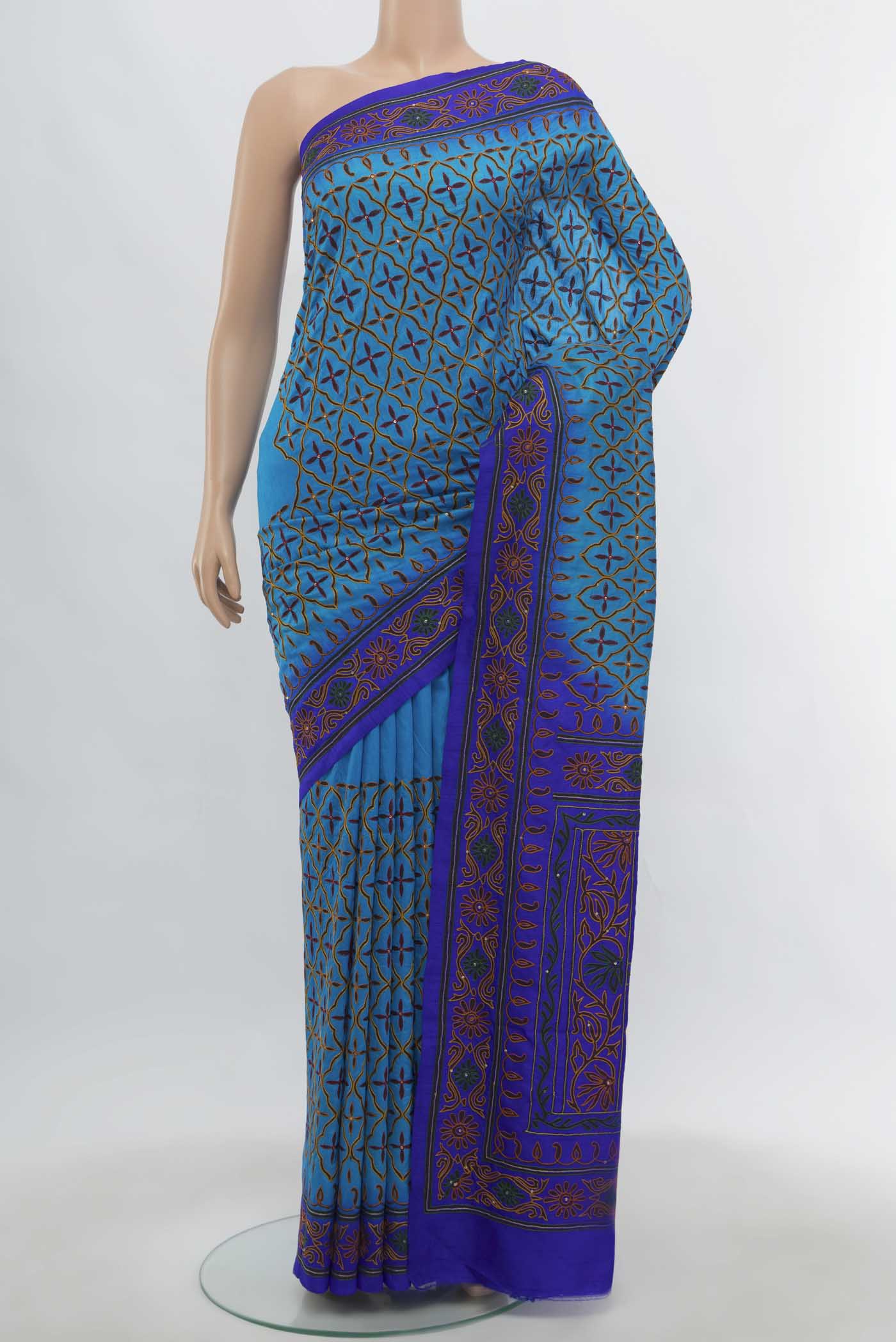 Light Blue Art Silk Saree with Embroidery on the body and Embroidery Border.  displayed on a mannequin