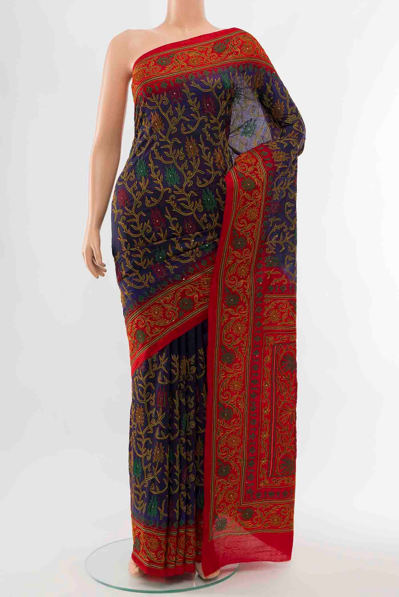 Navy Blue Blended Raw Silk Saree with Embroidery on the body and Embroidery Border displayed on a mannequin