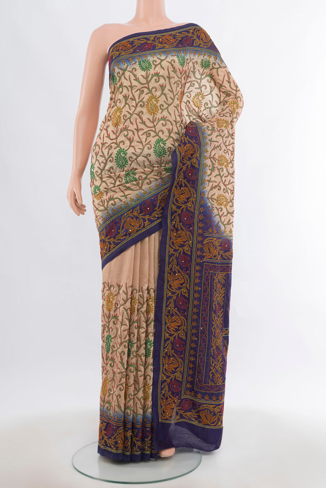 Dark Beige Art Silk Saree with Embroidery on the body and Silk Border.  displayed on a mannequin
