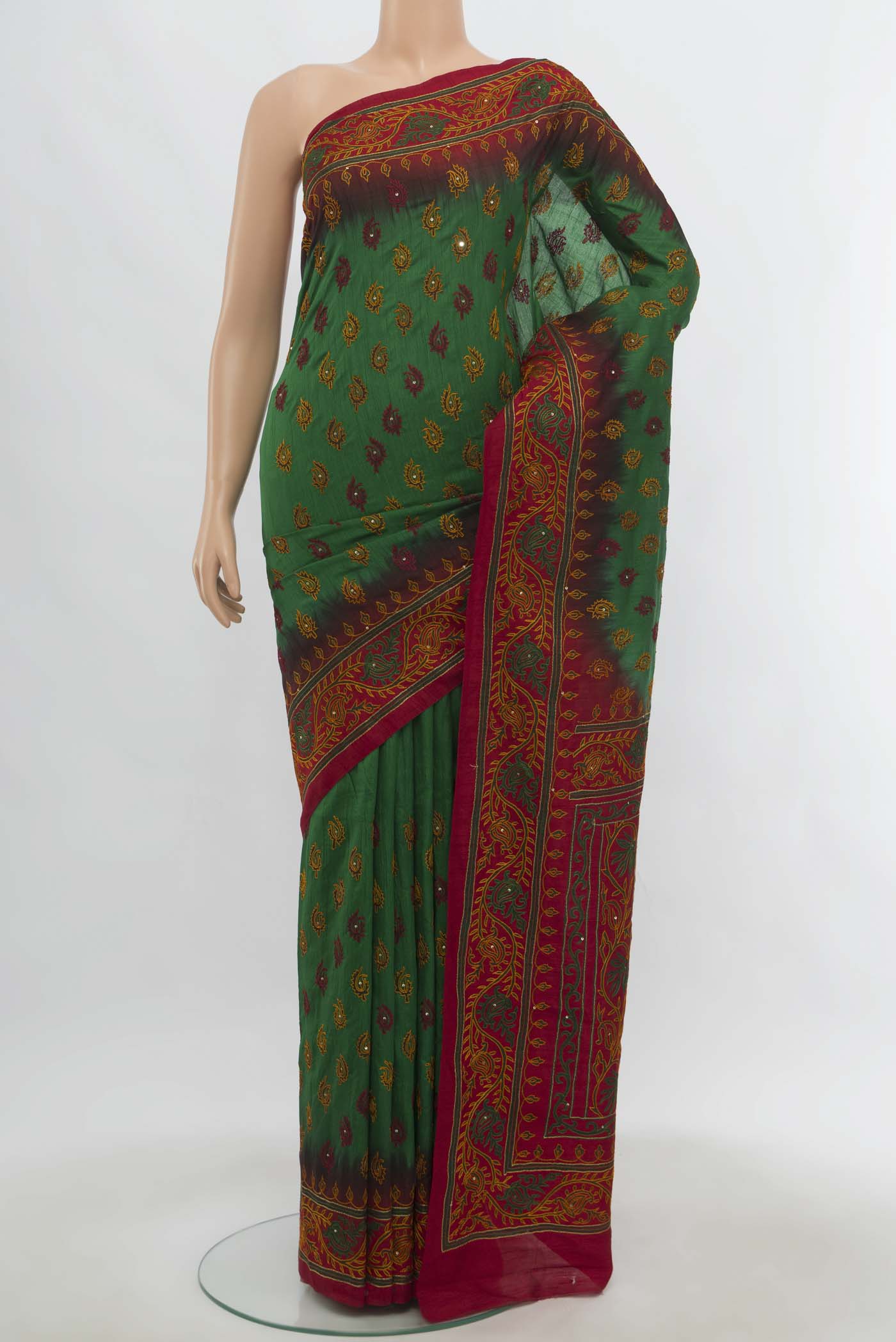 Bottle Green Art Silk Saree with Embroidery on the body and Embroidery Border.  displayed on a mannequin