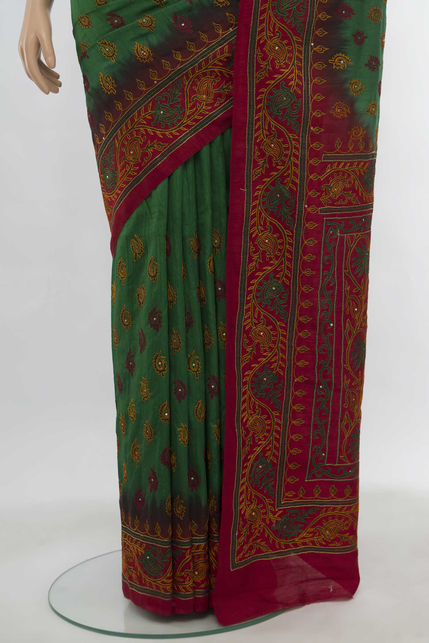 Pleats and pallu of Bottle Green Art Silk Saree with Embroidery on the body and Embroidery Border. 