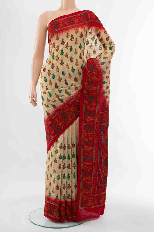 Beige Blended Raw Silk Saree with Embroidery on the body and Embroidery Border displayed on a mannequin