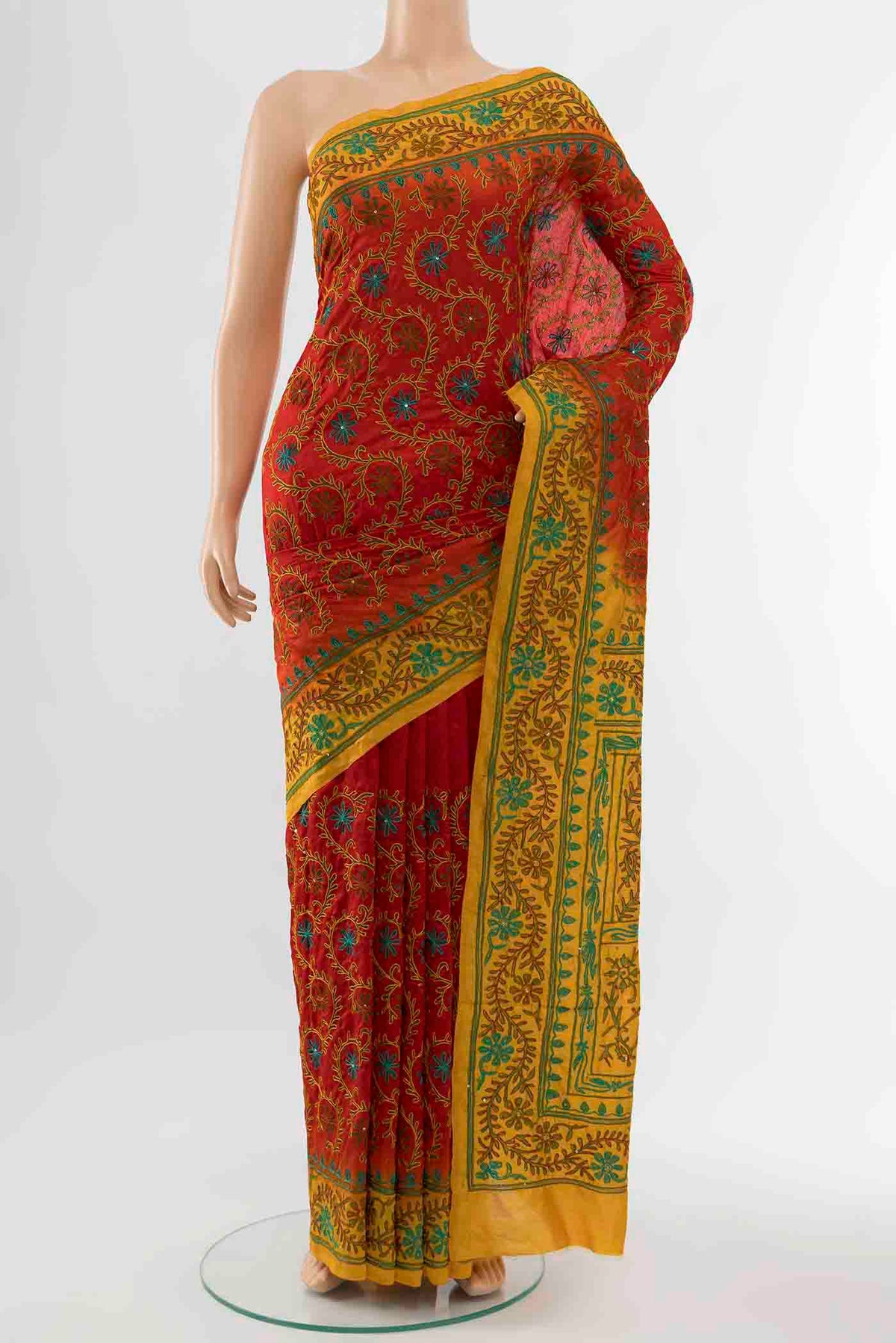 Red Blended Raw Silk Saree with Embroidery on the body and Embroidery Border displayed on a mannequin