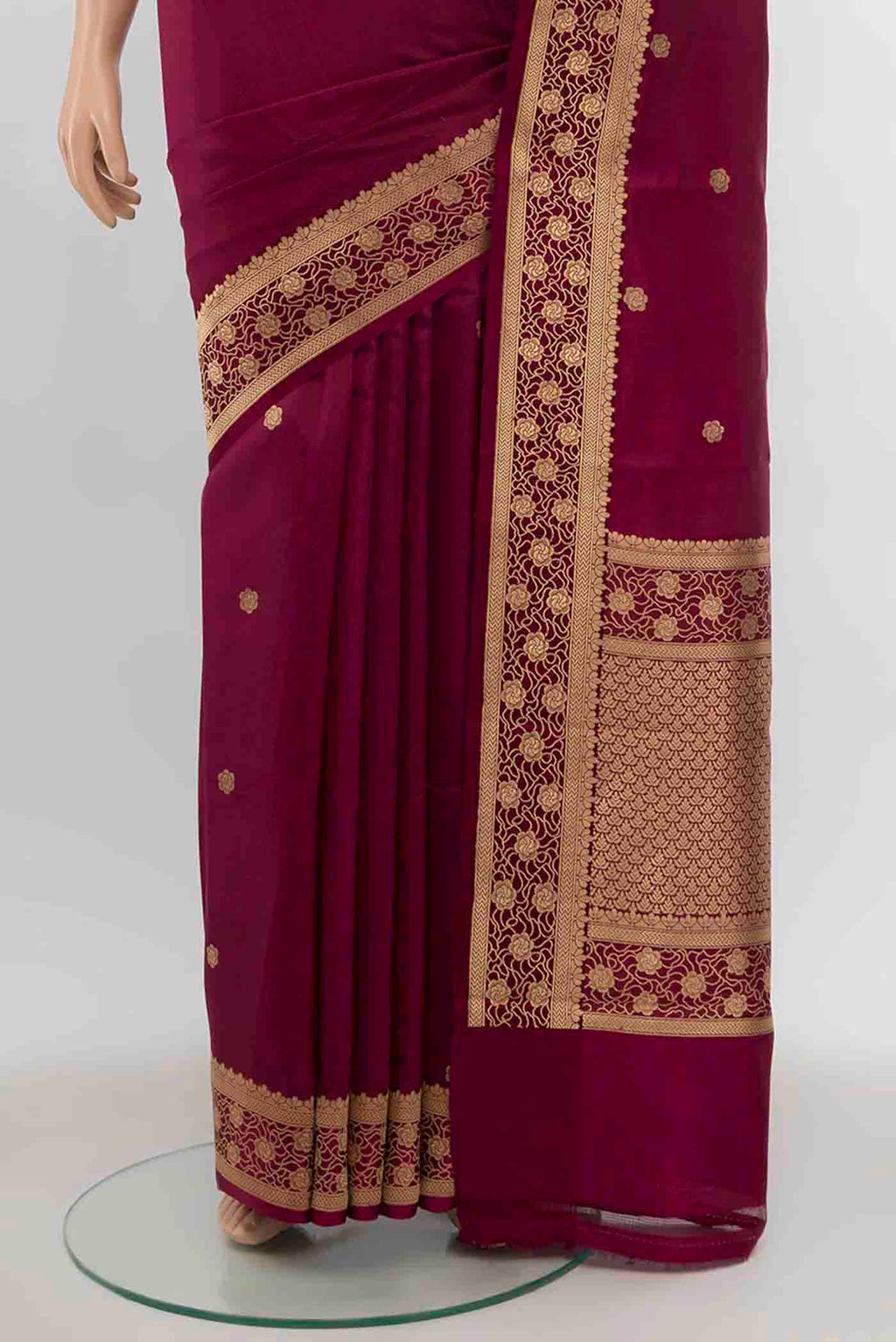 Pleats and pallu of Maroon Banarasi Katan Silk Saree with Zari Butta on the body and Silk Border
