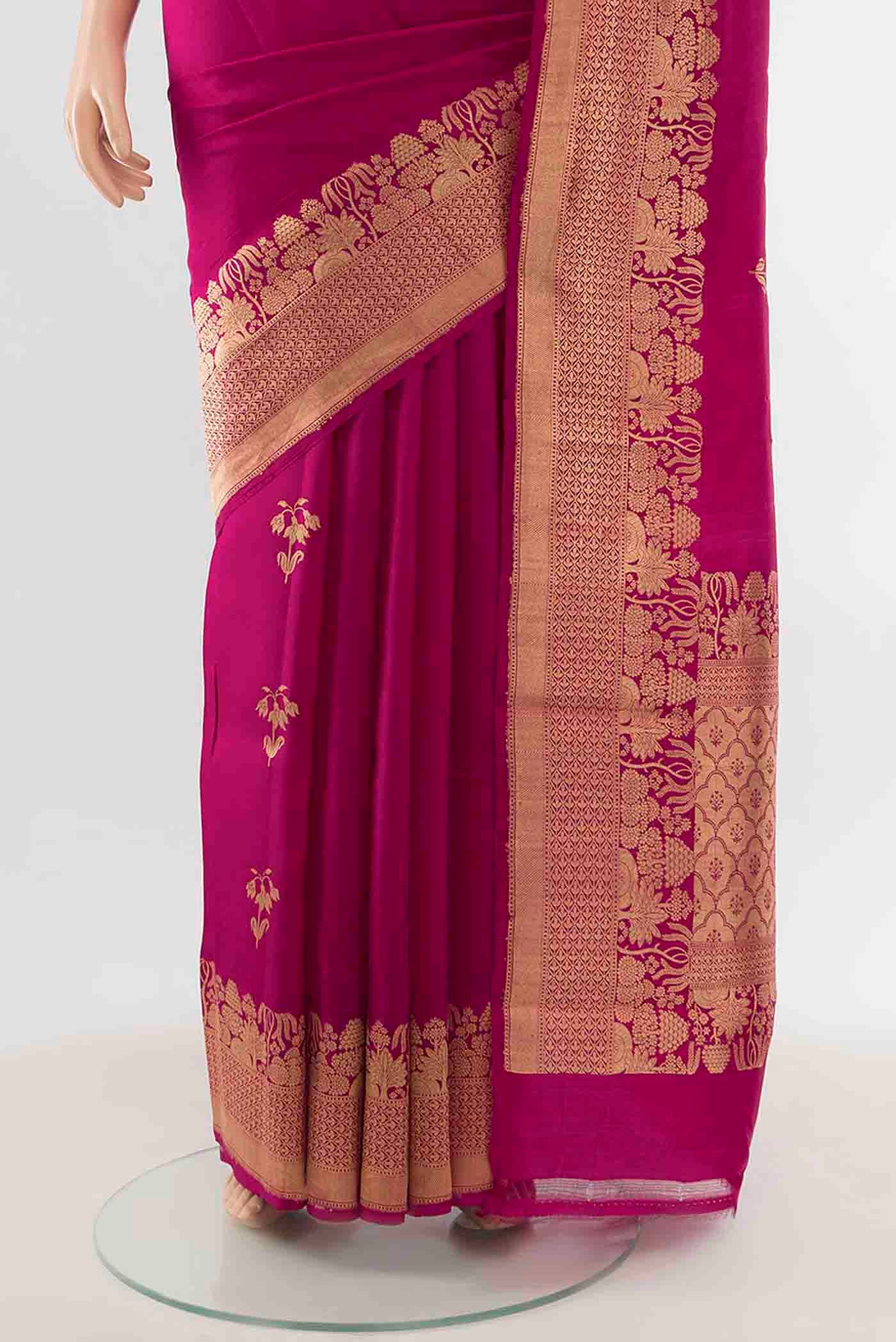 Pleats and pallu of Magenta Banarasi Katan Silk Saree with Zari Butta on the body and Zari Border