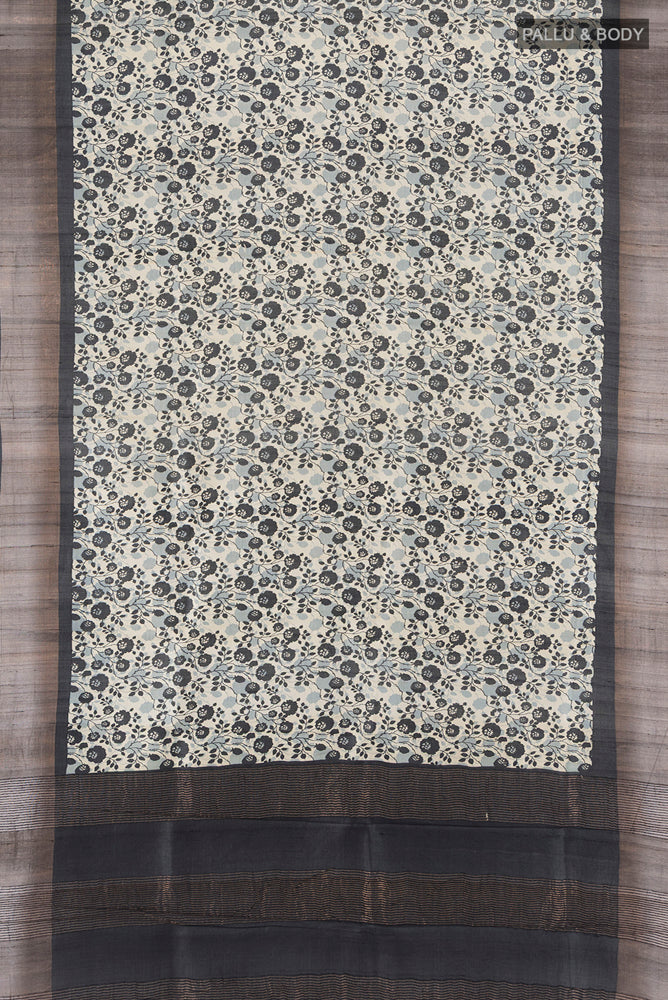 Flat view of Multi Color Tussar Silk Saree with Zari Butta on the body and Silk Border. 