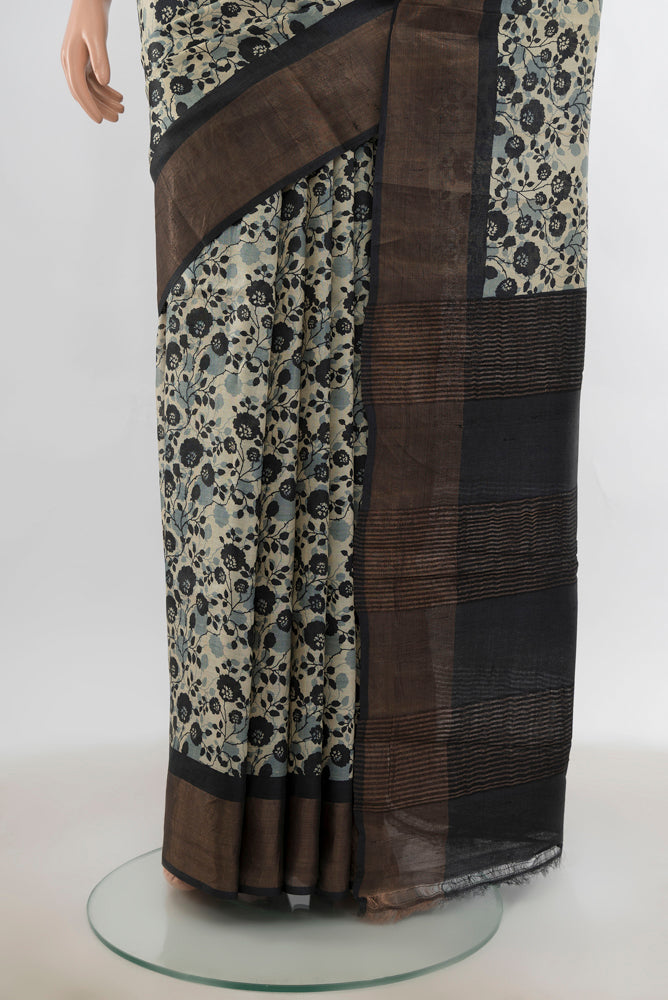 Pleats and pallu of Multi Color Tussar Silk Saree with Zari Butta on the body and Silk Border. 