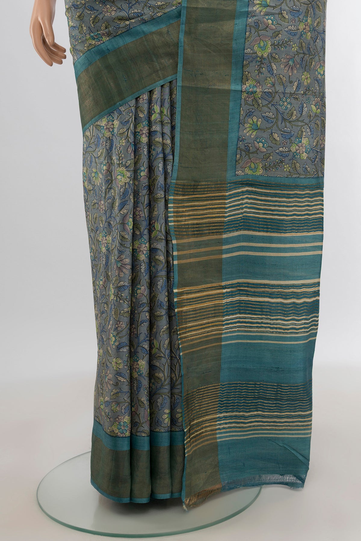 Pleats and pallu of Davys Grey Tussar Silk Saree with Floral Print on the body and Zari Border. 