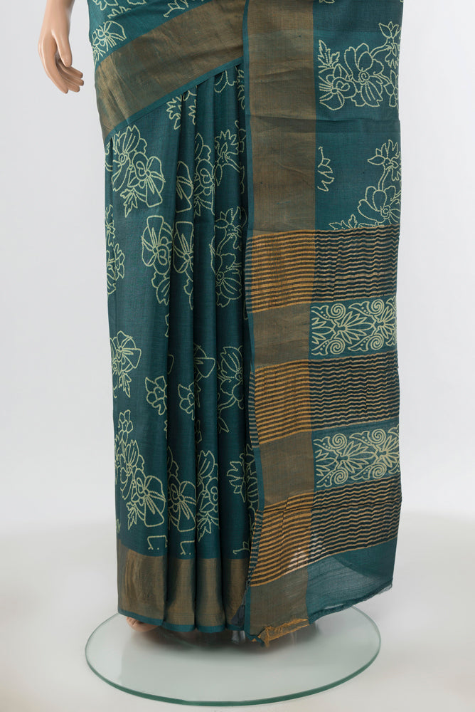 Pleats and pallu of Davys Grey Tussar Silk Saree with Floral Print on the body and Silk Border. 