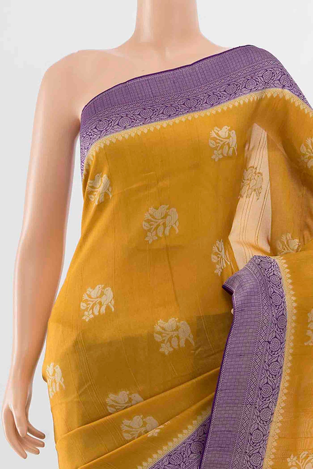 Border image of Yellow Blended Art Silk Saree with Zari Butta on the body and Zari Border