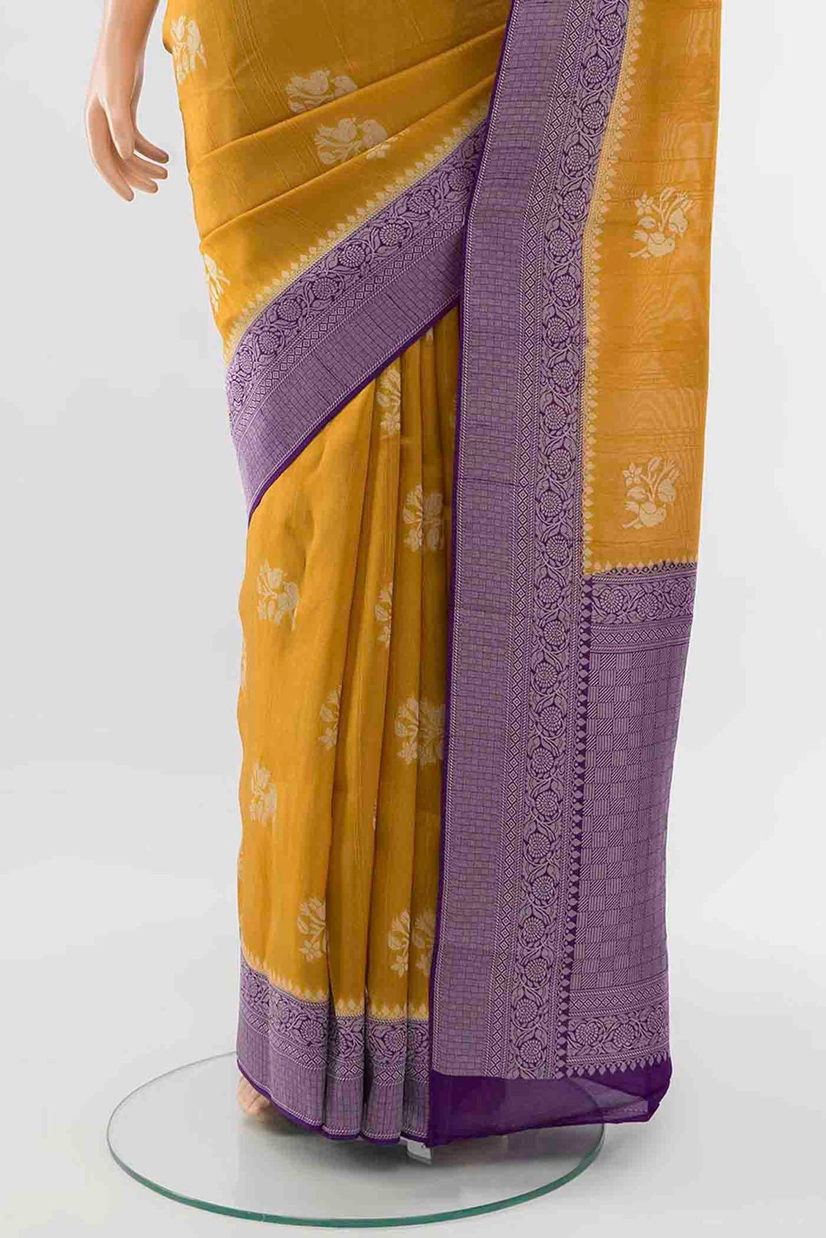 Pleats and pallu of Yellow Blended Art Silk Saree with Zari Butta on the body and Zari Border