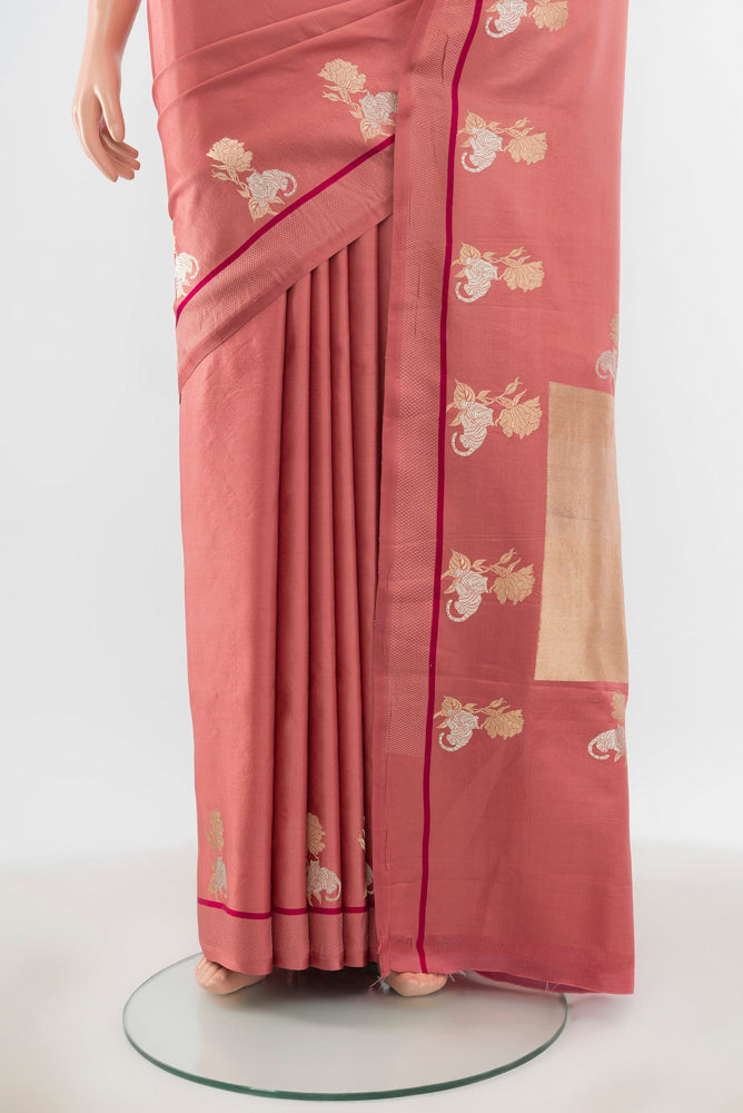 Pleats and pallu of Pure Silk Pure Zari Bronze Banarasi Katan Saree with Zari Butta on the body and Silk Border. 