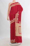 Red Banarasi Silk Saree with Zari Butta on the body and Zari Border.  displayed on a mannequin