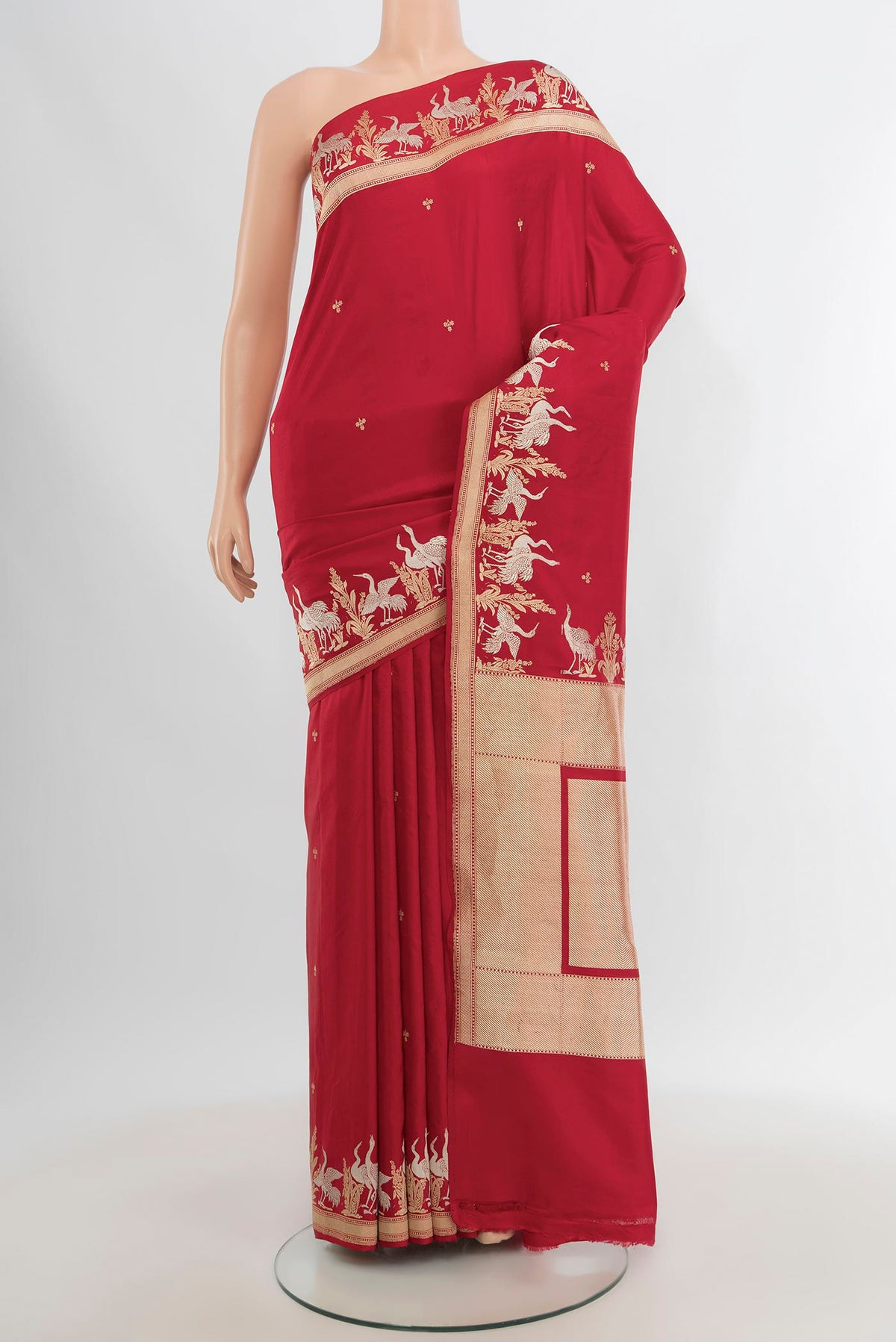 Red Banarasi Silk Saree with Zari Butta on the body and Zari Border.  displayed on a mannequin