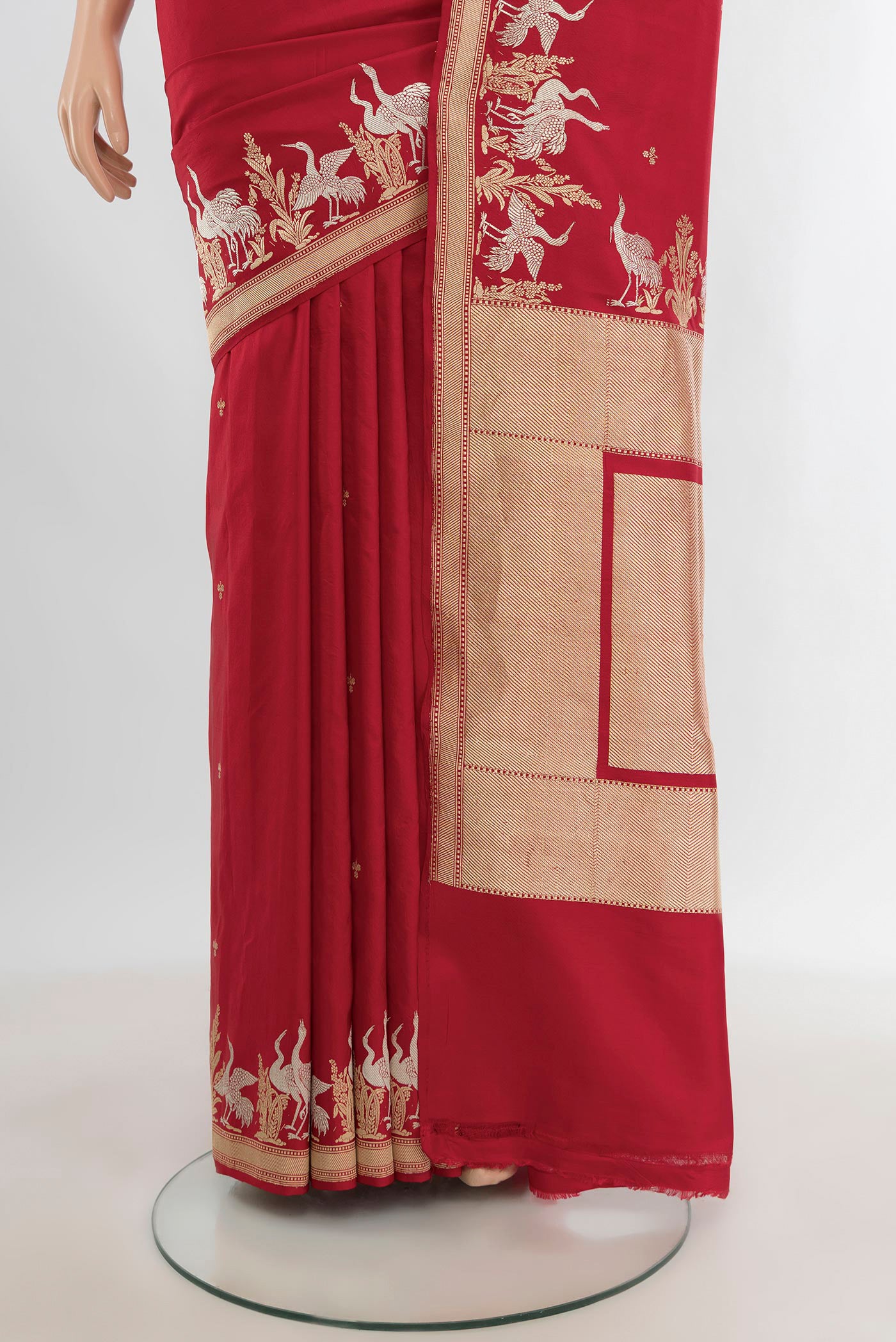 Pleats and pallu of Red Banarasi Silk Saree with Zari Butta on the body and Zari Border. 