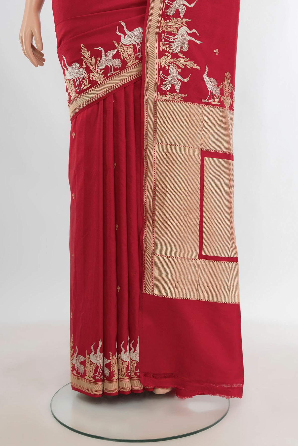Pleats and pallu of Red Banarasi Silk Saree with Zari Butta on the body and Zari Border. 