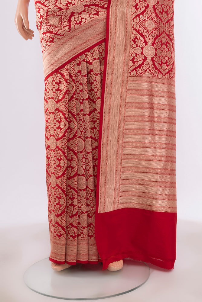 Pleats and pallu of Red Banarasi Silk Saree with Zari Butta on the body and Silk Border. 