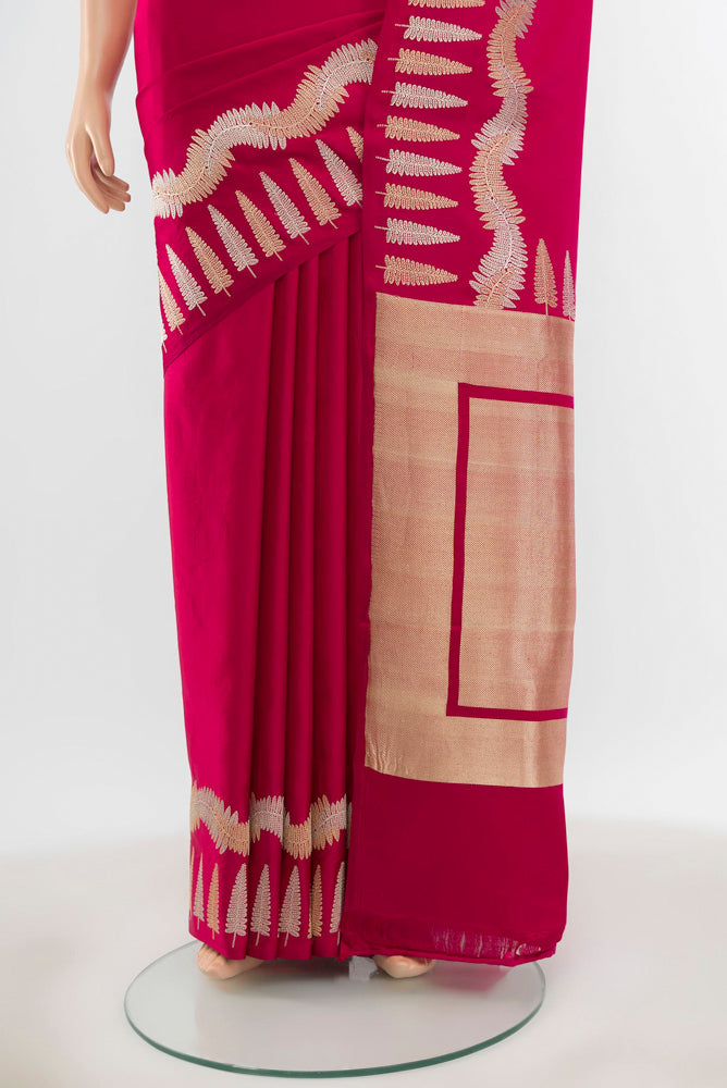 Pleats and pallu of Pure Silk Pure Zari Dark Pink Banarasi Katan Saree with Zari Butta on the body and Silk Border. 