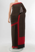 Black Printed Silk Saree with Floral Print on the body and Printed Border.  displayed on a mannequin