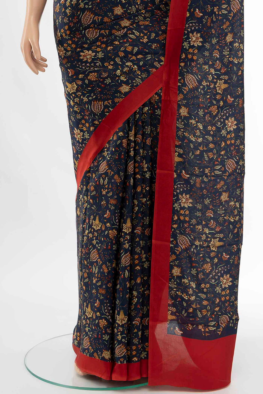 Pleats and pallu of Navy Blue Printed Silk Saree with Floral Print on the body and Fancy Border