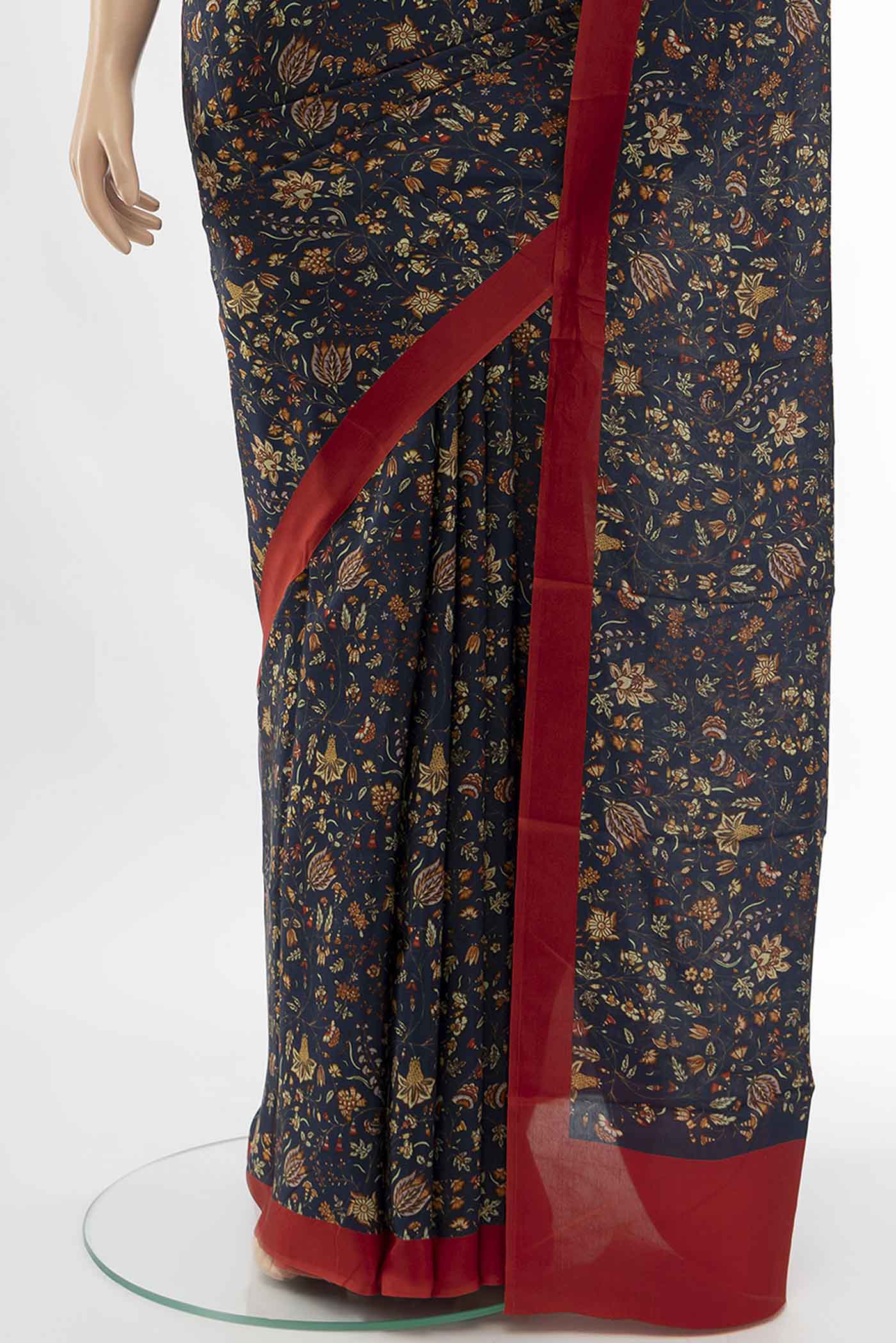 Pleats and pallu of Navy Blue Printed Silk Saree with Floral Print on the body and Fancy Border