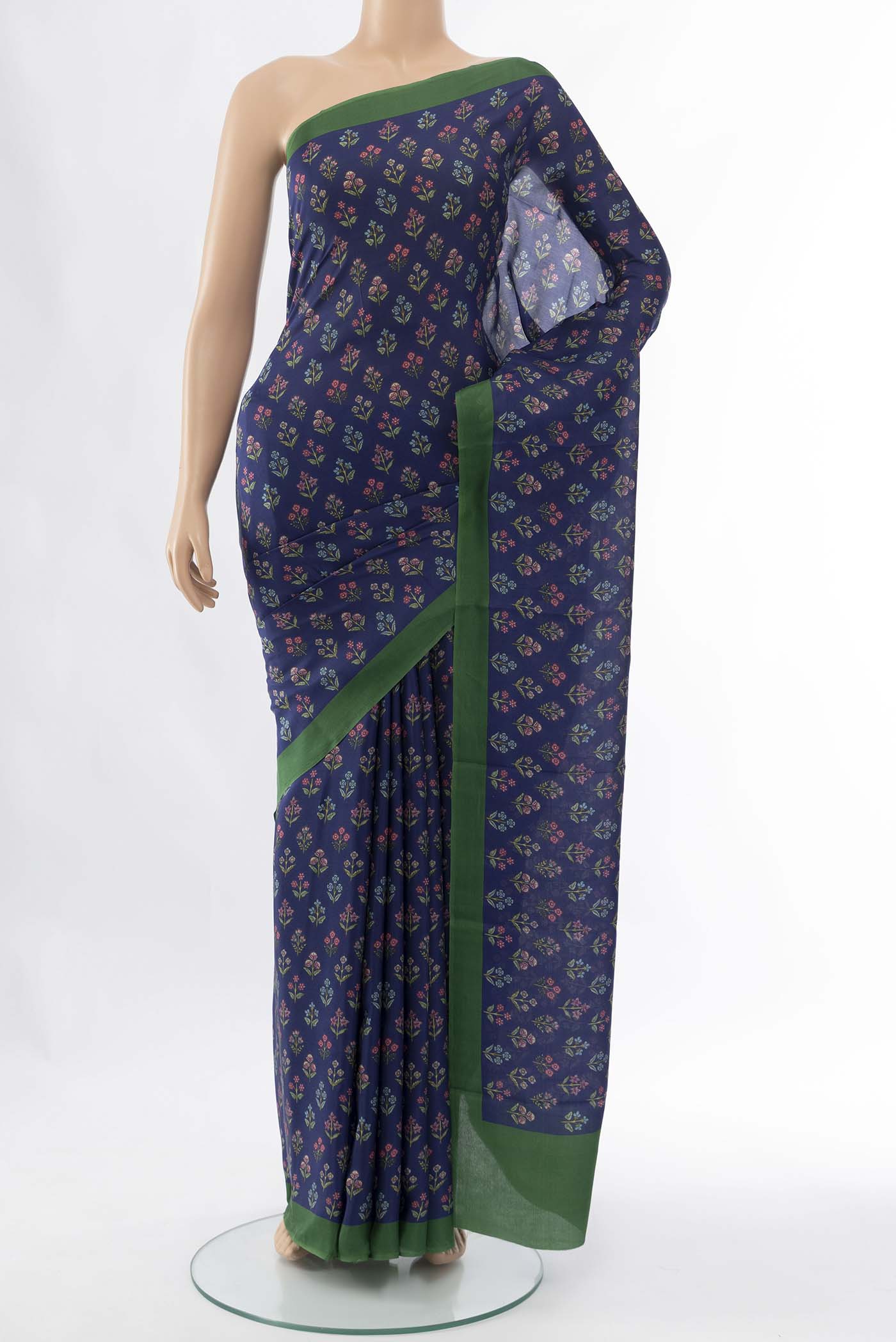 Navy Blue Printed Silk Saree with Floral Print on the body and Attached Border displayed on a mannequin