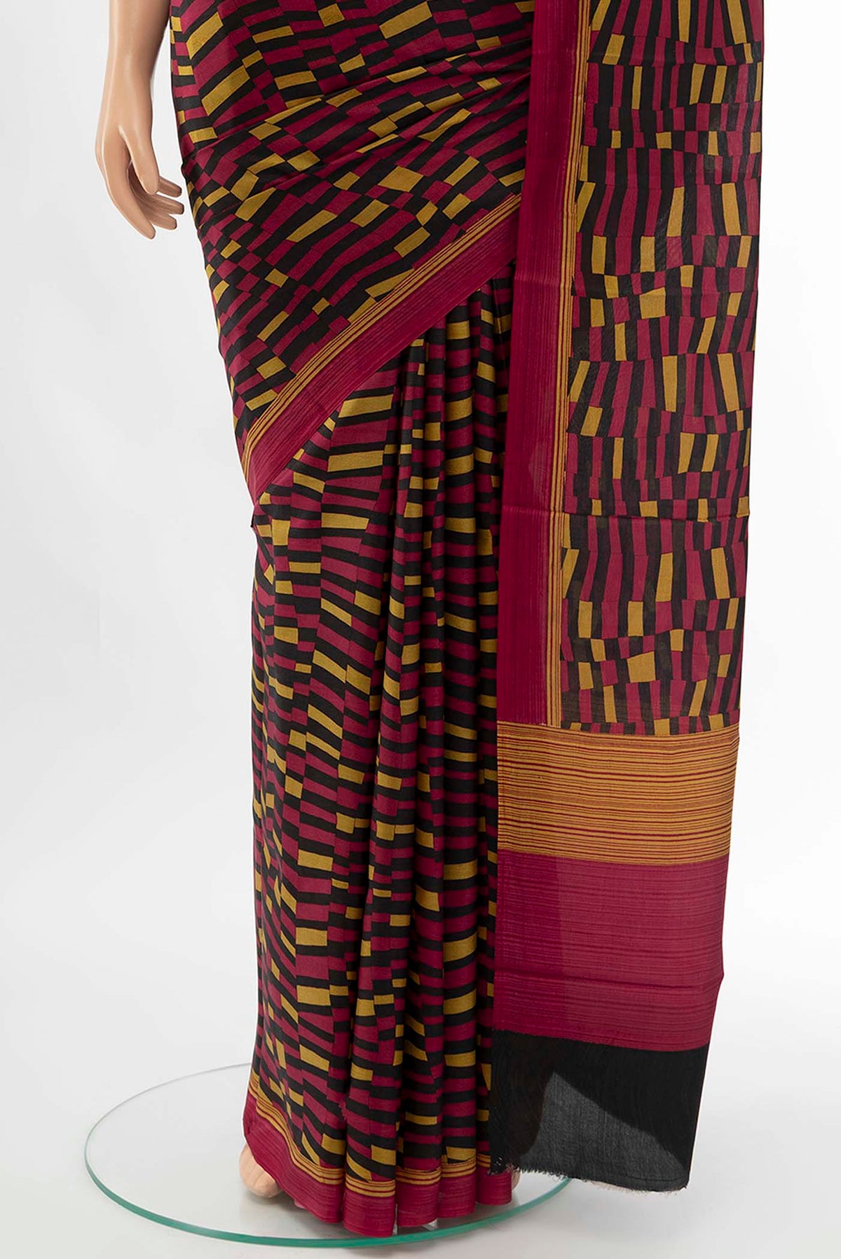 Pleats and pallu of Black Printed Silk Saree with Floral Print on the body and Fancy Border
