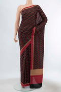 Pure Silk Pure Zari Black Printed Saree with Floral Print on the body and Fancy Border displayed on a mannequin