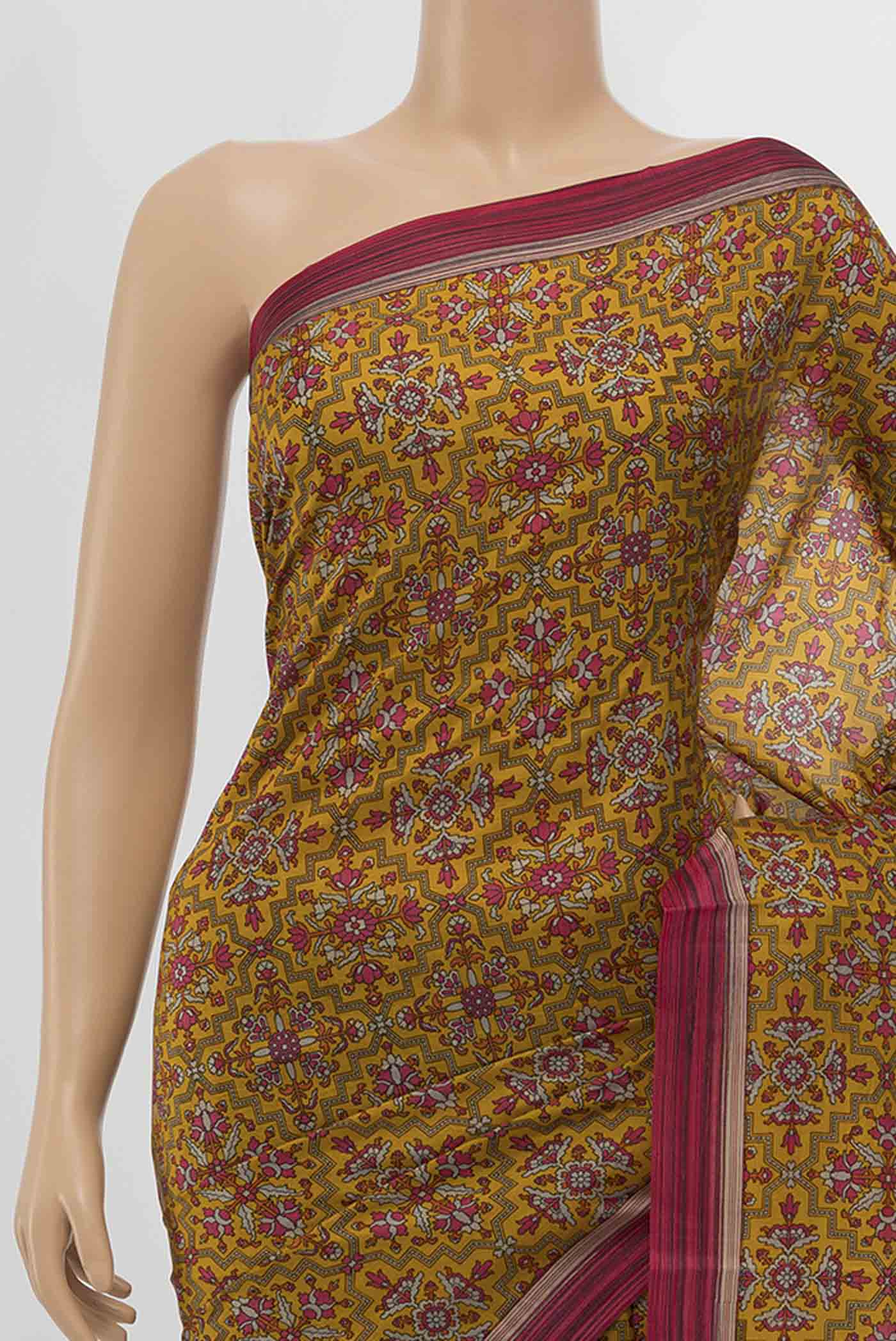Border image of Rust Printed Silk Saree with Floral Print on the body and Silk Border