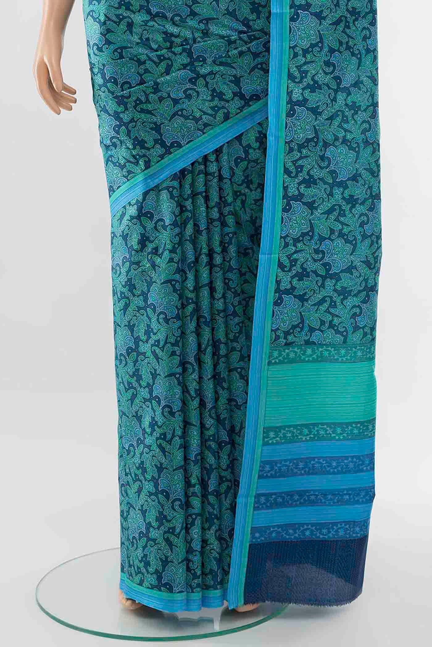 Pleats and pallu of Light Green Printed Silk Saree with Floral Print on the body and Plain Border