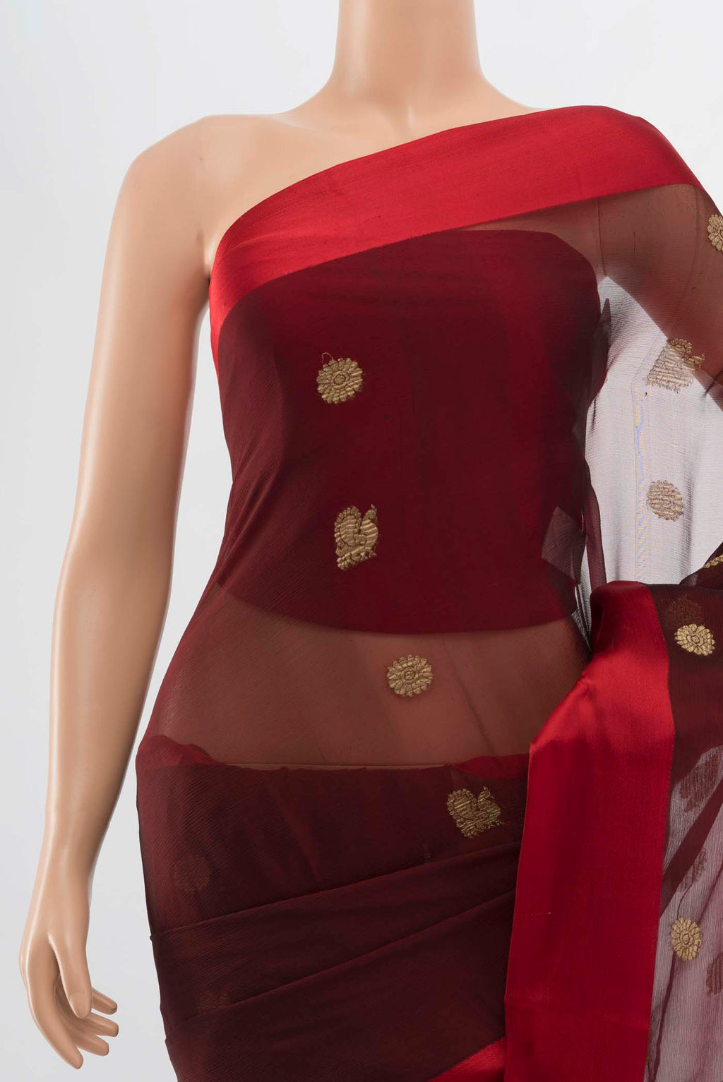 Border image of Maroon Chiffon Saree with Zari Butta on the body and Silk Border