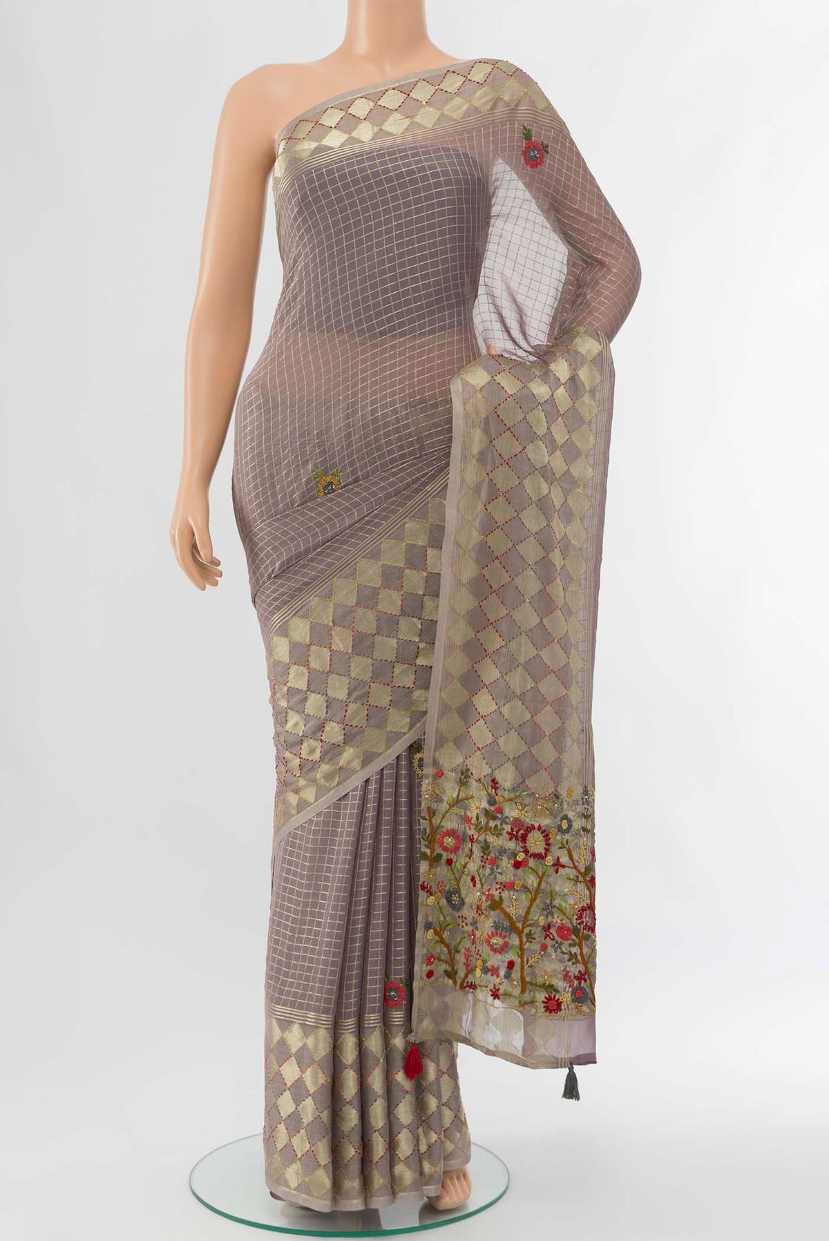 Grey Georgette Saree with Zari Brocade on the body and Silk Border displayed on a mannequin