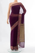 Magenta Mysore Chiffon Saree with Zari Butta on the body and Silk Border displayed on a mannequin