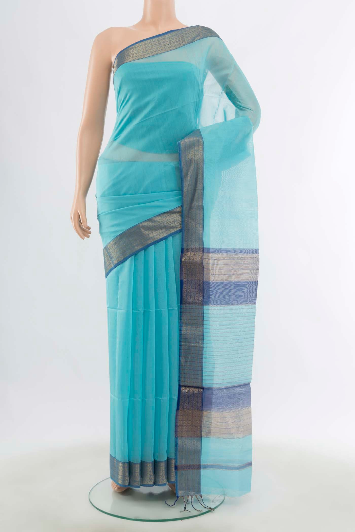 Sky Blue Maheshwari Silk Cotton Saree with Zari Butta on the body and Silk Border displayed on a mannequin