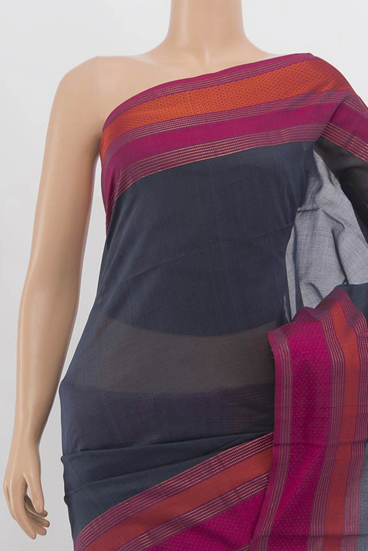 Border image of Grey Maheshwari Silk Cotton Saree with Zari Butta on the body and Silk Border. 
