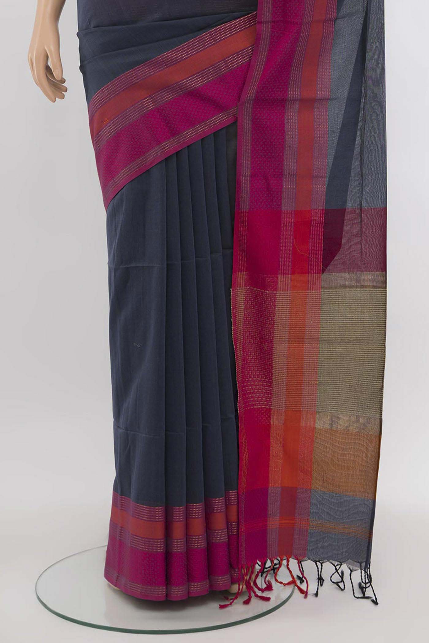 Pleats and pallu of Grey Maheshwari Silk Cotton Saree with Zari Butta on the body and Silk Border. 
