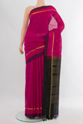 Dark Pink Silk Cotton Saree with Checked design on the body and Zari Border.  displayed on a mannequin