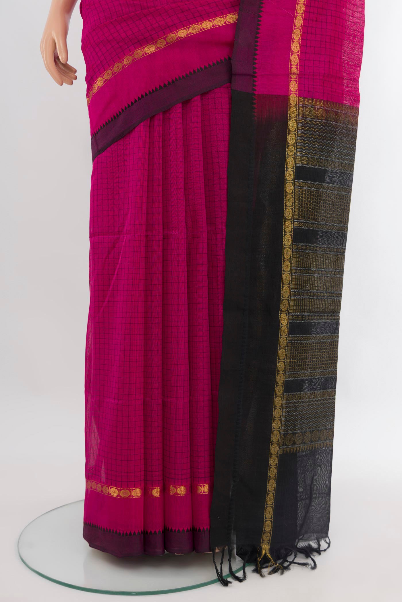 Pleats and pallu of Dark Pink Silk Cotton Saree with Checked design on the body and Zari Border. 