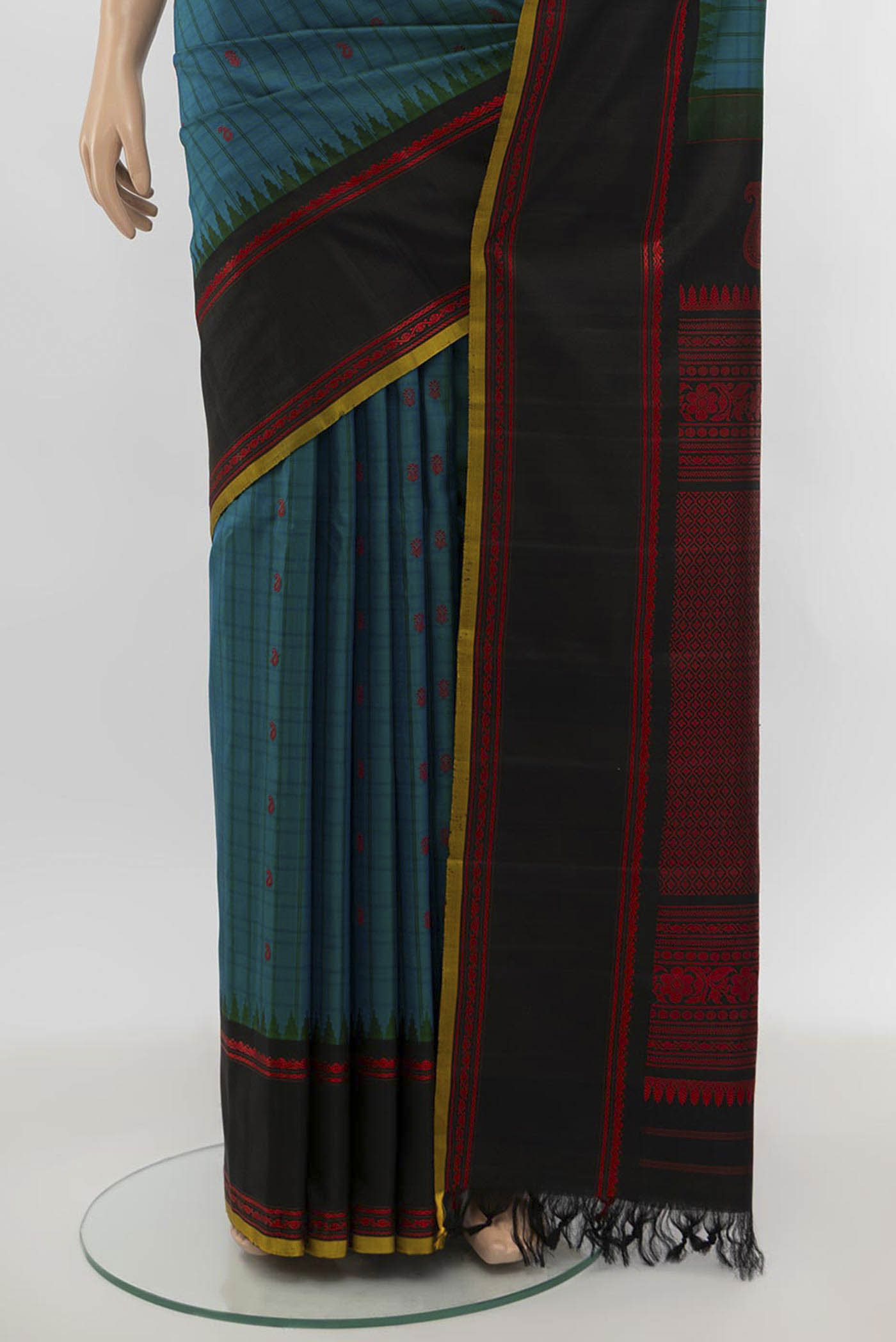 Pleats and pallu of Peacock Blue Gadwal Silk Saree with Zari Butta on the body and Silk Border. 